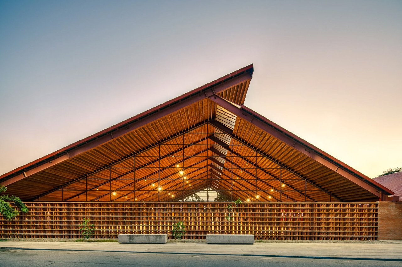 #A brick music school in Mexico features a cantilevered roof made from locally sourced coconut wood