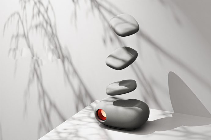 Revive nostalgia with this camera projector that resembles stacked stones while displaying your best memories