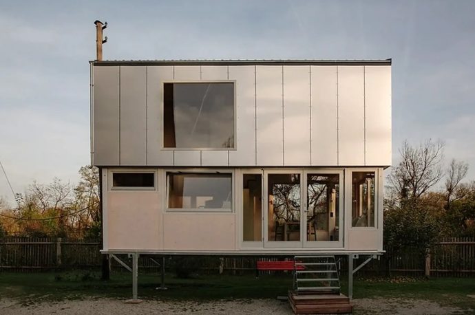 This two-story tiny home redefines modern micro-living setups
