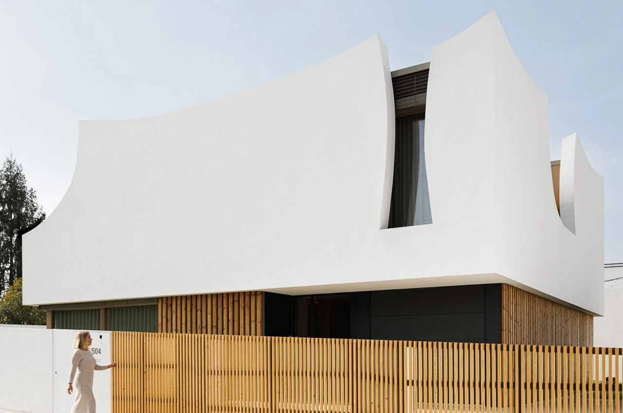 #Minimal white home in Portugal is adorned with flower petal-inspired walls