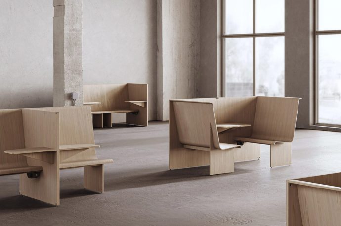 Minimal wooden cubicle-like furniture system creates cozy + comfy nooks in modern office spaces