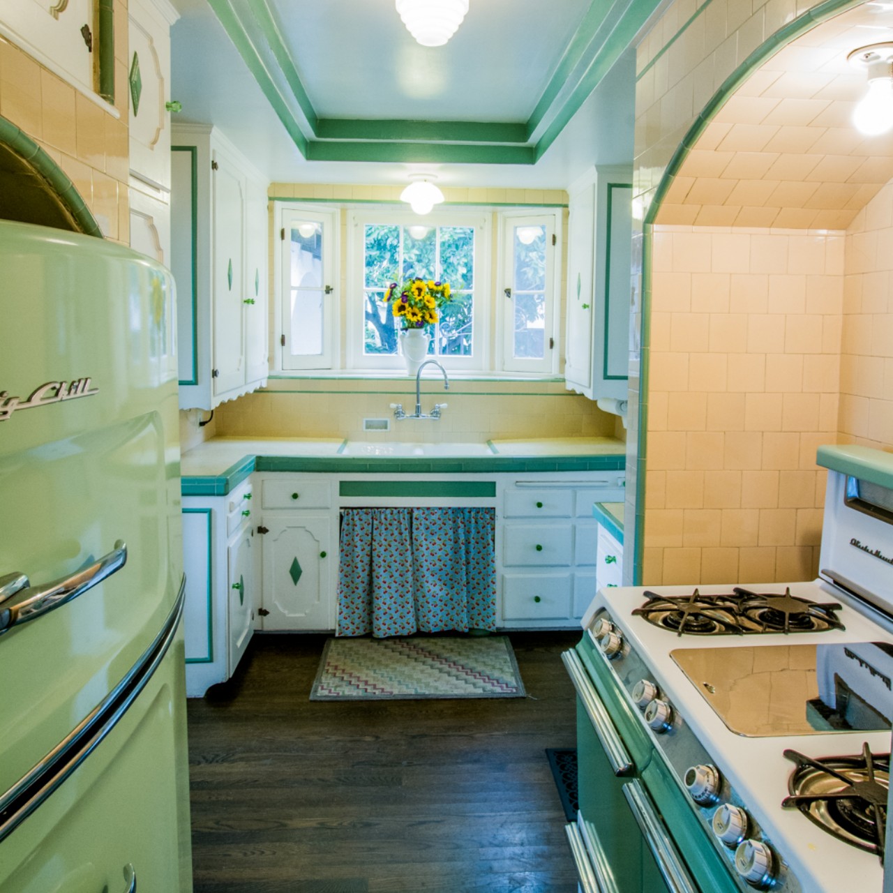 A Vintage Retro Kitchen With Pastel-Colored Appliances And A Refrigerator  Ai Generated Art