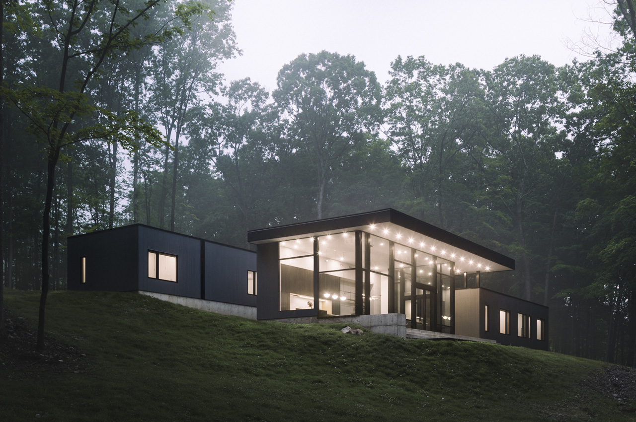 #Dark wood-clad home is perched perfectly on a sloped site in Upstate New York