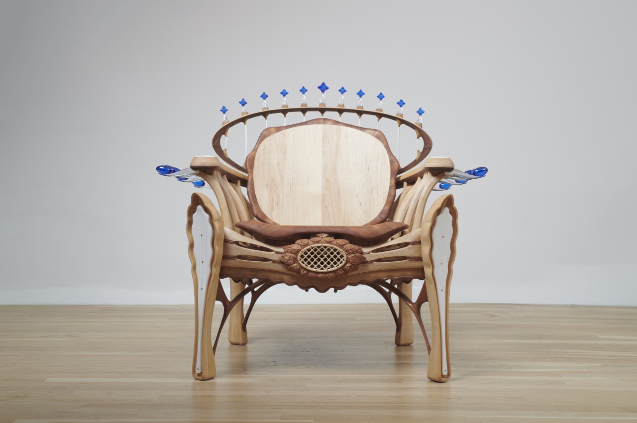 #This majestic chair of wood and glass will make you feel like a ruler of the cosmos