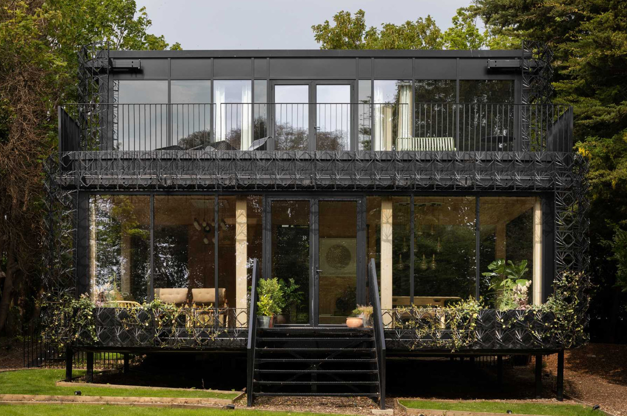 #All-black home features an intricate steel facade to allow plants to climb + grow over the house