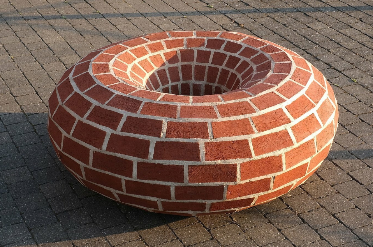 #Repurposed Bricks find a new home with this round bench at historic London wharf