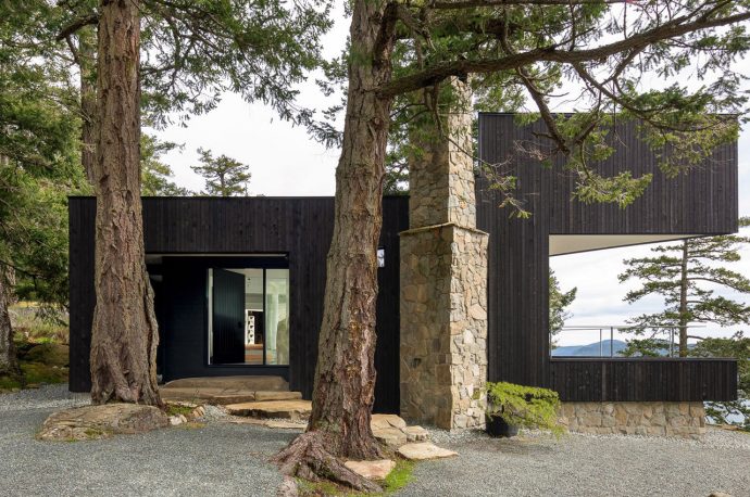 All-Black Island Cabin Hidden Away In a 52.7-Acre Mountain Is The Ultimate Remote Getaway Location