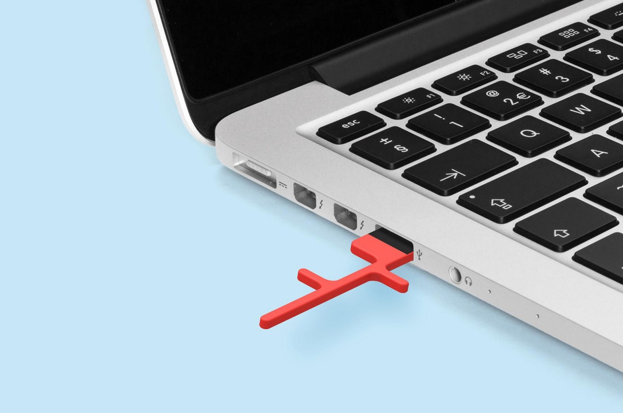 #This odd USB stick concept fits in between a laptop screen and keys so you never lose it