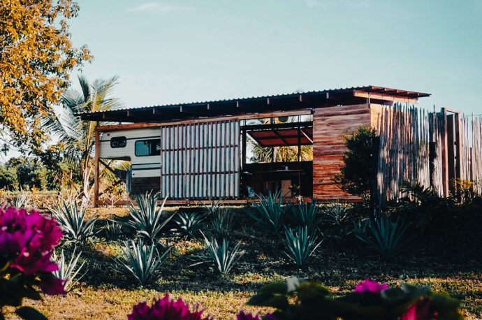 A camper van enveloped by teak creates a cabin where you can be one with nature