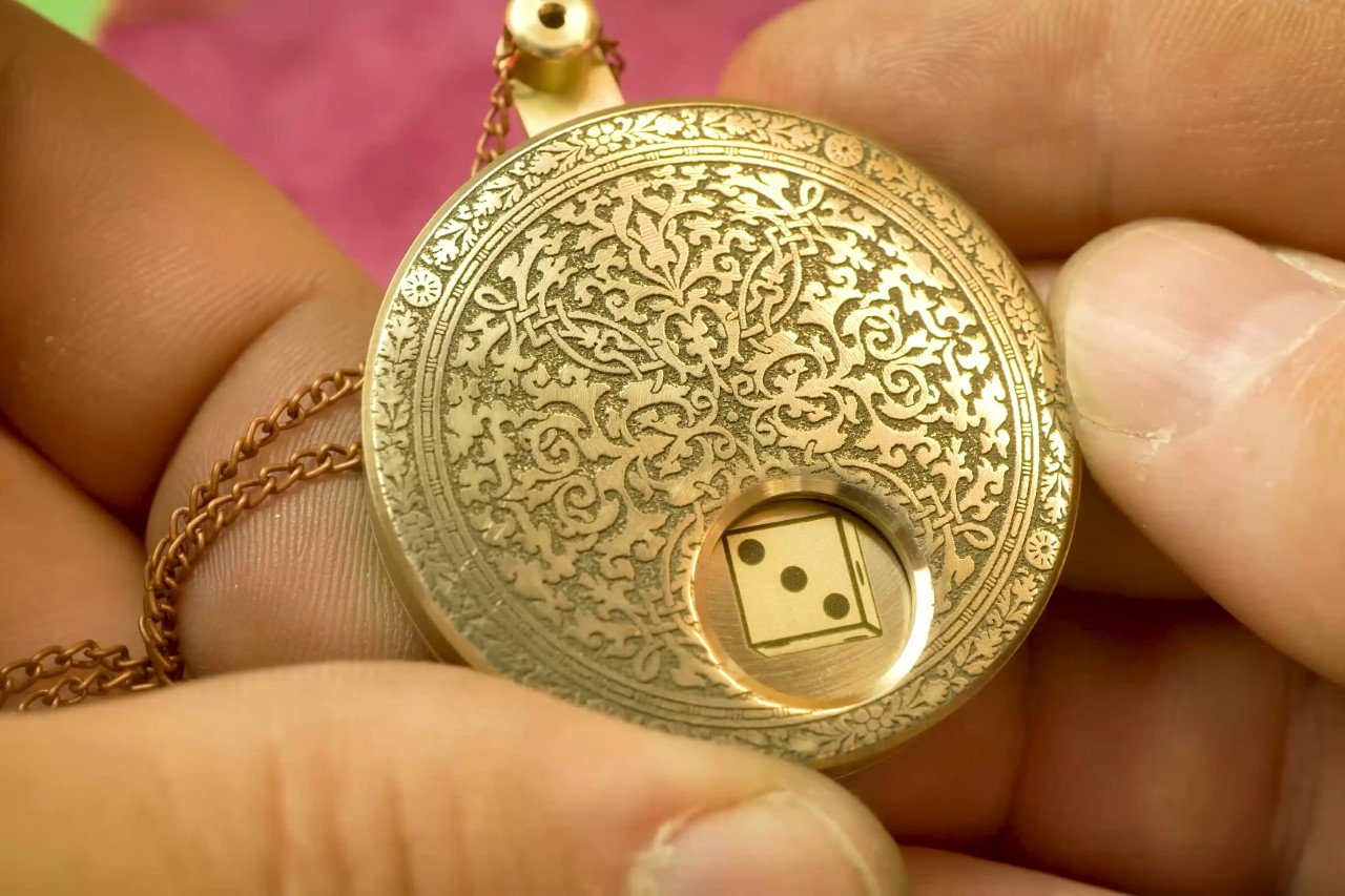 This Bizarrely Beautiful Mechanical Dice has the appeal of a Vintage Steampunk Pocket Watch
