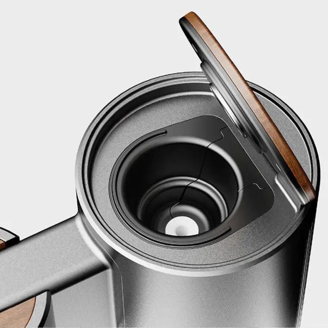 https://www.yankodesign.com/images/design_news/2023/09/portable-capsule-coffee-machine-lets-you-be-caffeinated-in-automated-cars/4.jpg