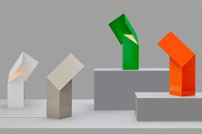 Minimalist lamp uses simple, linear shapes to create a functional and ambient light source