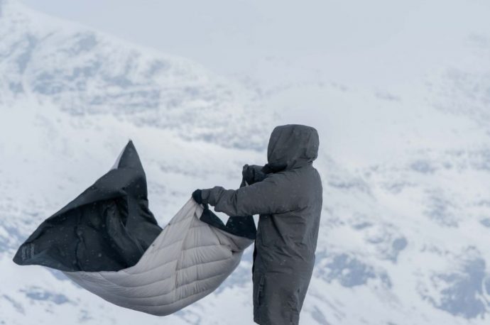 Puffy blanket turns into an outdoor coat, is made from 100% recycled materials