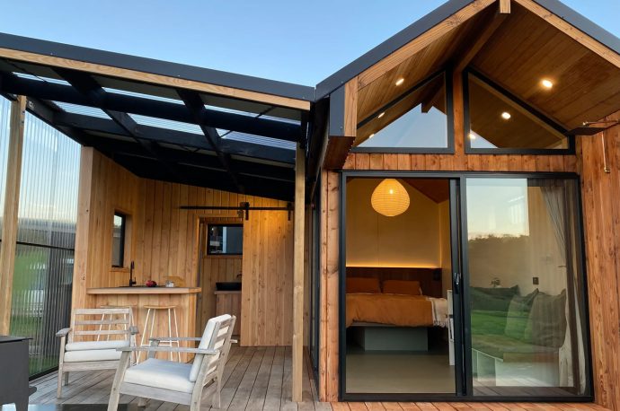 This Wooden Tiny Home Feels & Looks Like A Beachfront Getaway But Is A Full-Time Dwelling