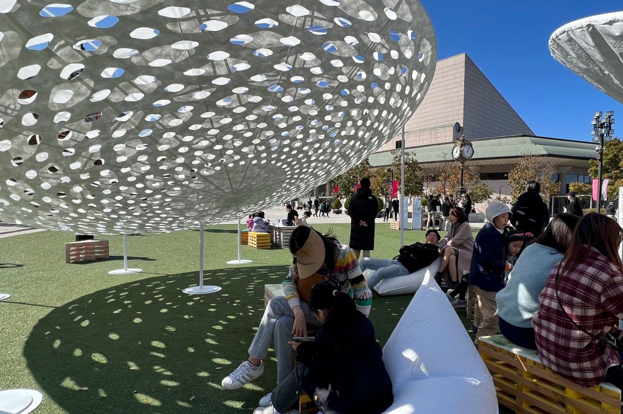 #The Volvo Circle Pavilion uses perforated Tyvek to mimic the feeling of sitting under a tree