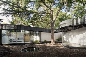 A Latticed Timber Roof & A Lebanese Cedar Tree In The Center Make This Unique Structure Truly Stand Out