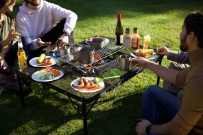 Forget Hibachis, this Folding Barbecue Table seats 10 people for the perfect outdoor campfire meal