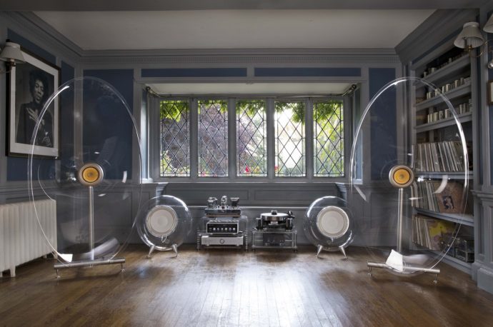 Huge transparent horn speakers deliver an odd yet beautiful way to enjoy music