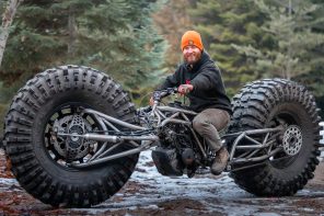 Motorcycle riding on monster wheels is a Batcycle on steroid ready to steamroll anything that lies ahead