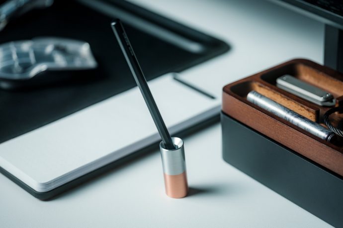 This ultra-minimalist pen stand makes your writing partner the center of attention