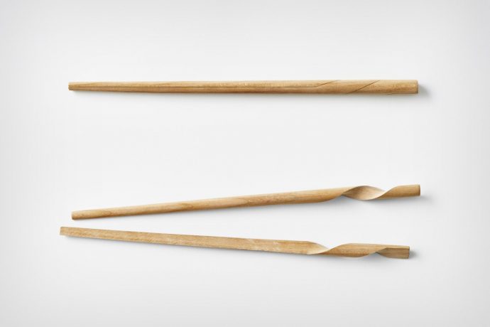 Nendo’s redesigned chopsticks intertwine into each other to create a singular cohesive form