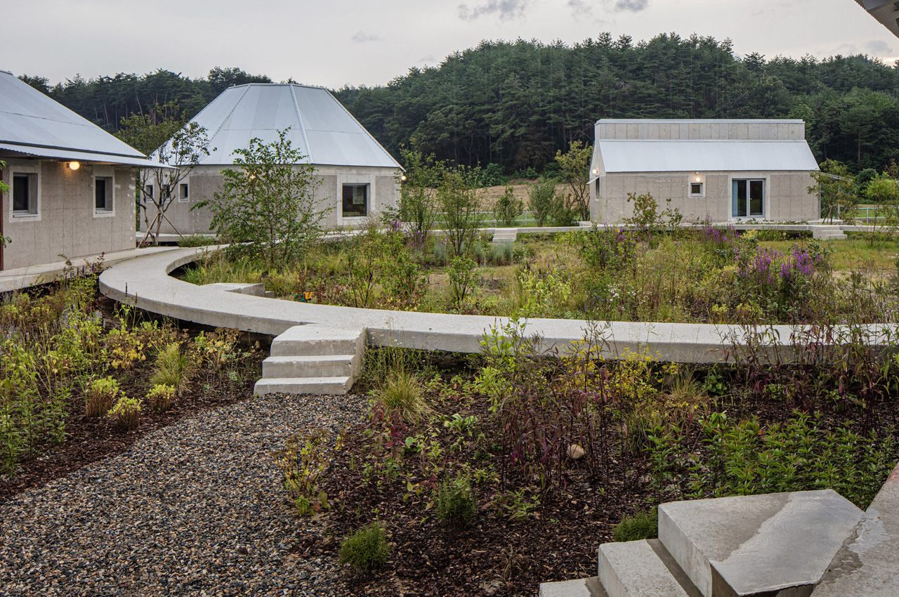 #Uniquely Shaped Concrete Dwellings Connected Via A Concrete Ring Showcase Community Living In South Korea