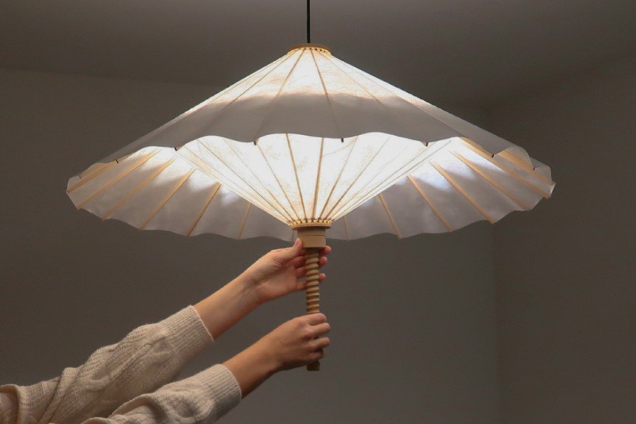 #This gorgeous Umbrella-inspired lampshade can be opened or closed to adjust brightness