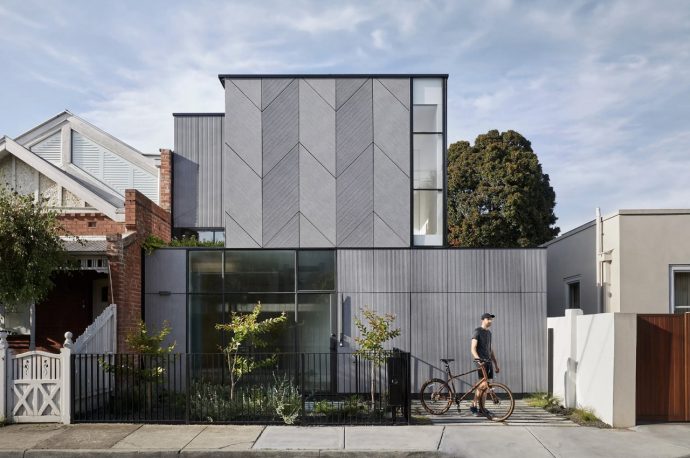 This Simple Boxy Home Conceals Multiple Gardens & A Light-Filled Interior Within