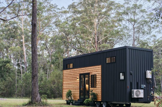 Cedar-Clad Tiny Home Expands With A Slide-Out Section & Supports A Total Off-Grid Lifestyle