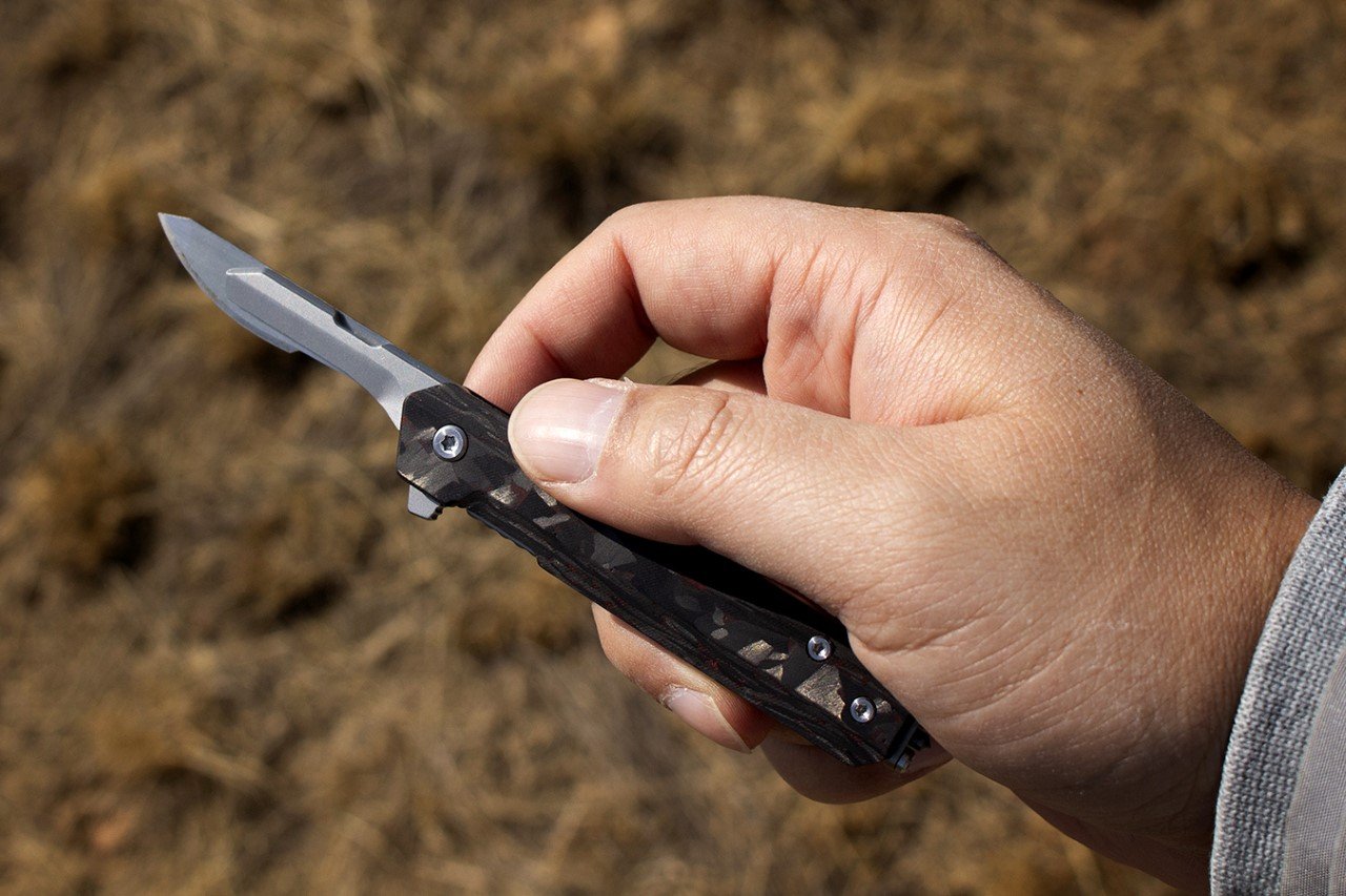 #Ultra-Light Tactical Titanium Pocket Knife Tips Scales at Just 1.3 Ounces