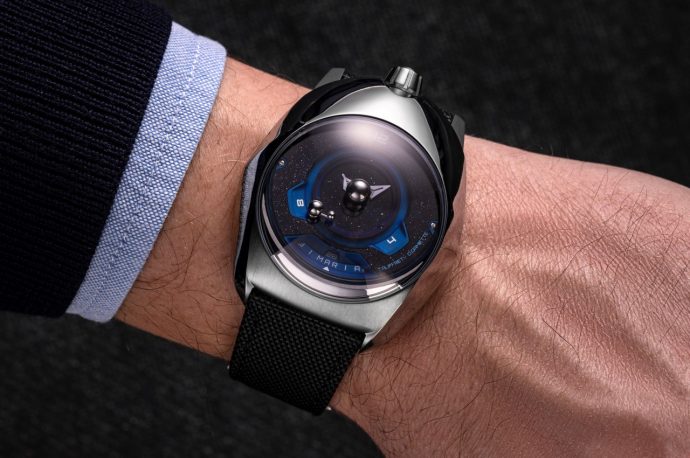 Space-inspired titanium watch traces the Earth and Moon’s orbit around the Sun