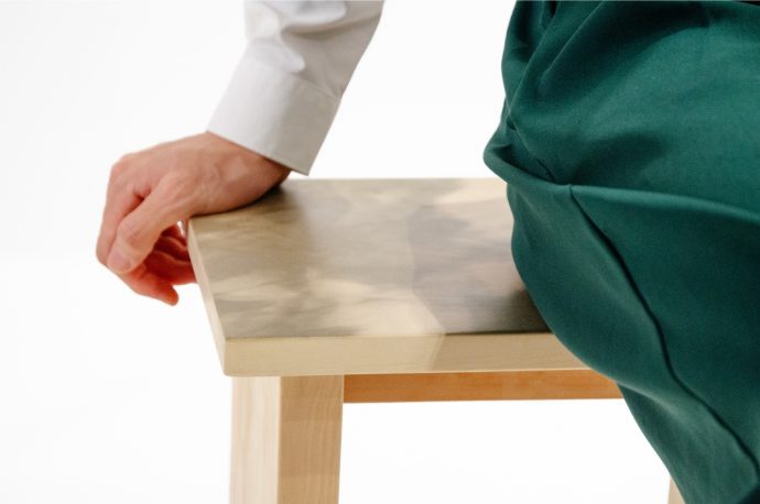 Stool has tree shadows printed on top to bring you closer to nature