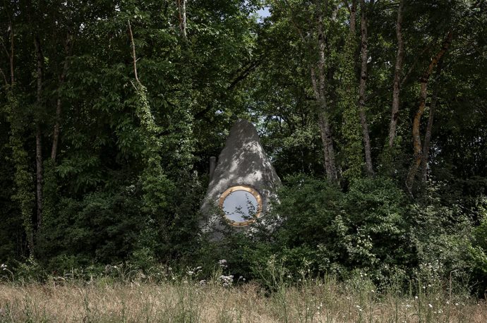 Fairytale-Inspired Tiny Cabin With A Rocky Exterior Perfectly Merges With The French Forest