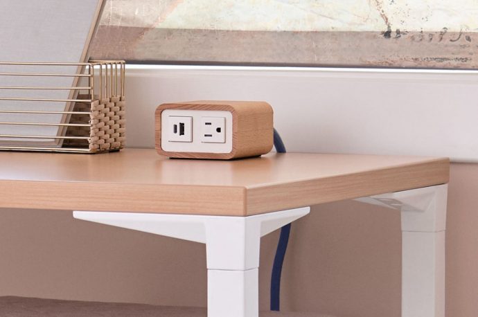 Wood-enclosed power supply box is designed to be seen