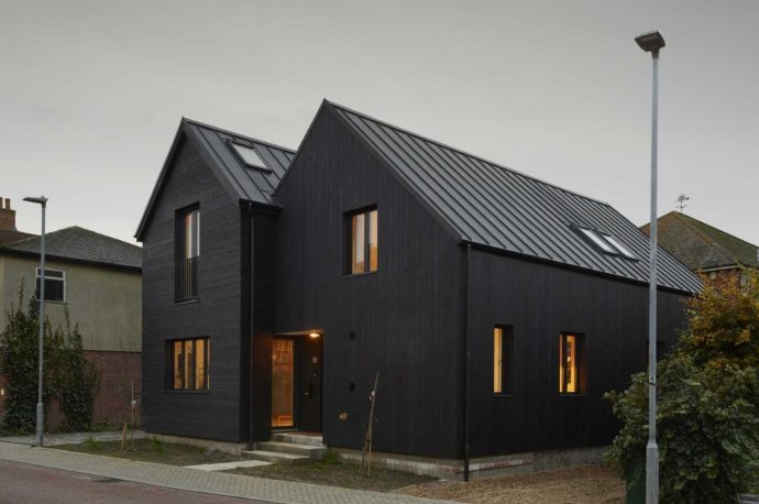 Paul Archer’s Latest Home Features A Mysterious Black Exterior that leads to a Pure White Interior