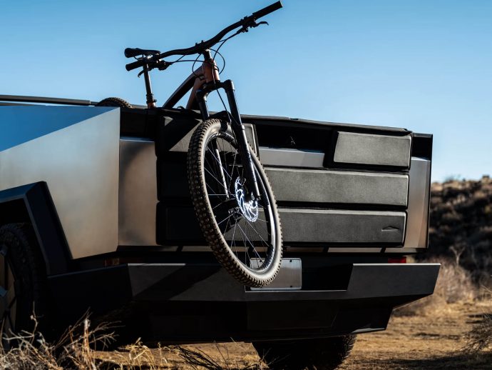 Tesla unveils tailgate shield and jumpseat for Cybertruck owners