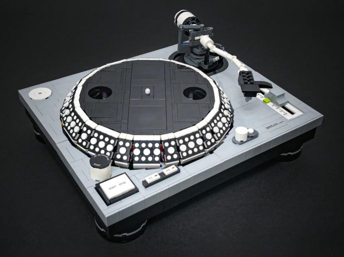 Fan-made LEGO Technics Turntable features rotating disc, movable tonearm, and sliding faders