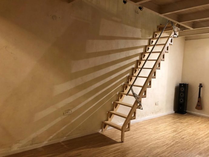 Bamboo folding staircase adds a bit of functional “art” to your space