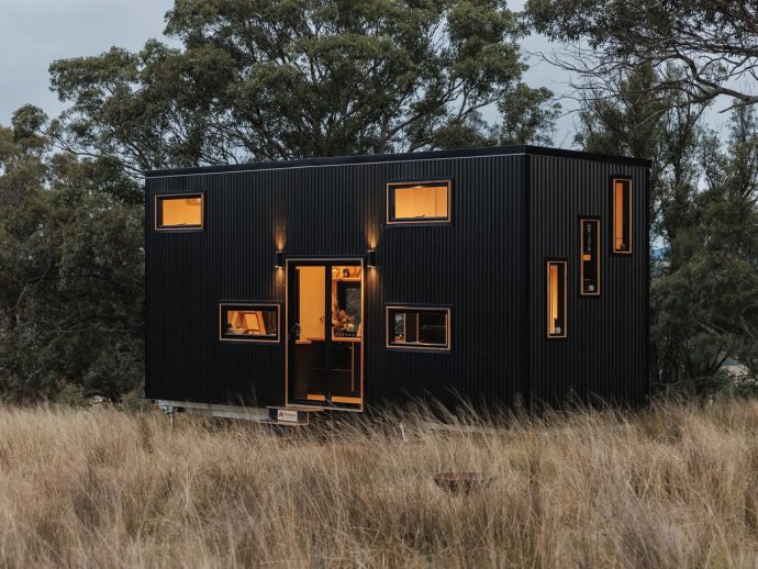 This All-Black Tiny Home Perfectly Accommodates A Family Of Four With A Space-Saving Interior Layout