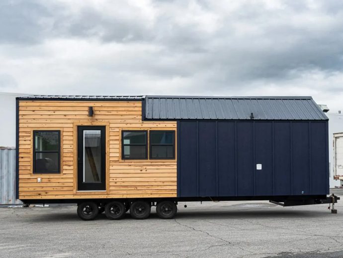 This Tiny Home With Extra Width Offers A Roomy & Apartment-Like Living Space