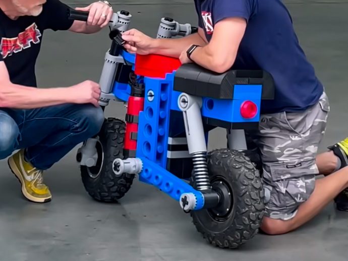 Scaled-up version of LEGO Technic 8810 café racer set by Matt Denton is a rideable electric monkey bike