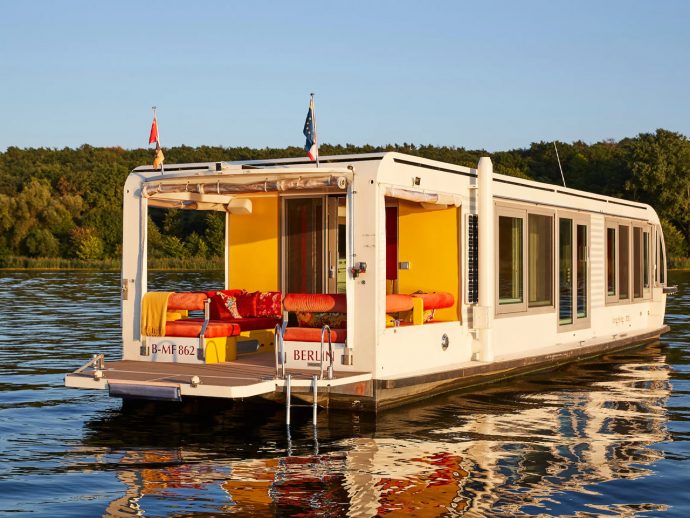 This Solar-Powered Tiny Houseboat Lets You Enjoy A Peaceful Life On The Water