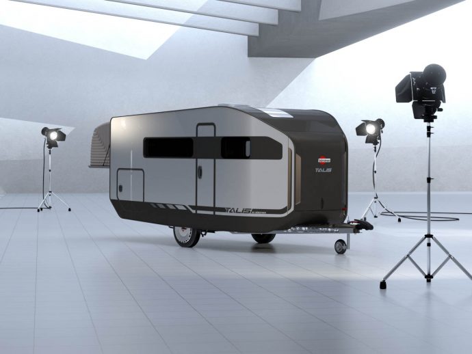 Trailer with a fish-inspired aerodynamic design showcases modular living space and inflatable construction