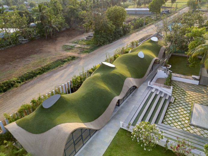 This School In India With An Undulating Green Roof & Sunken Courtyard Is A Relief From Boxy Classrooms