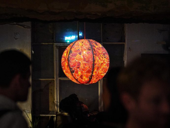 Sun-like pendant lamp is actually made from orange peel waste