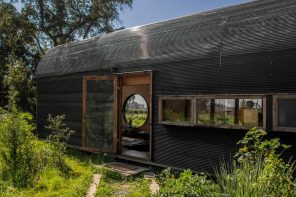 Vaulted Tiny Home Seems To Float Above The Ground, While Seamlessly Merging Indoors & Outdoors
