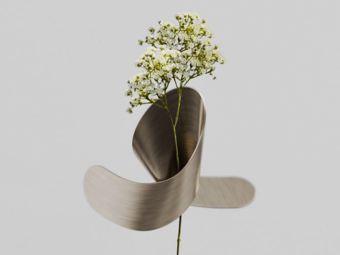 Ribbon-shaped brass vase turns drying flowers into vintage art objects