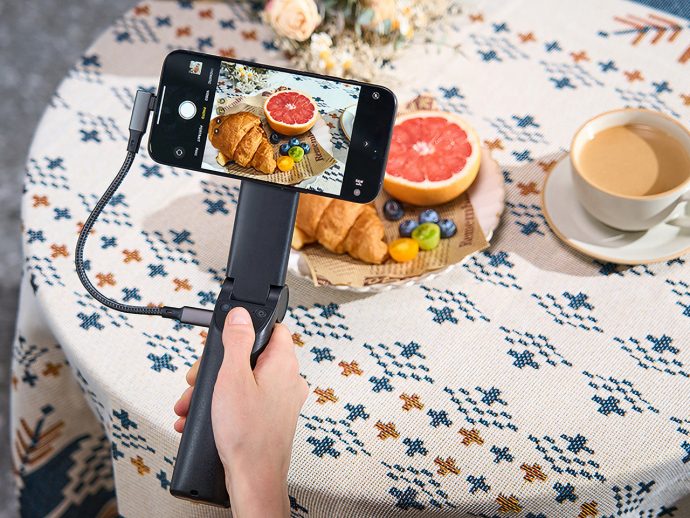 The Ultimate Grip-Stand For Mobile Content Creation with Built-in Cooling, SSD, and a Ring Light
