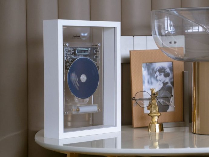 This $99 Transparent CD Player Frame Is the Ultimate Retro Tech Flex