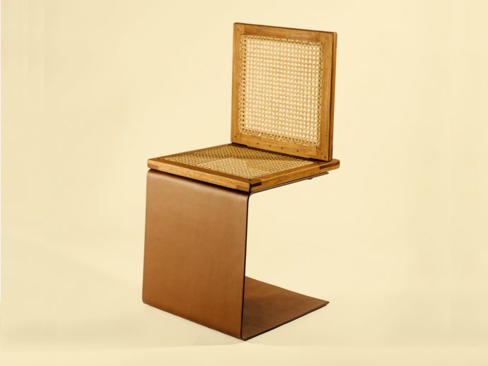 One-legged wooden chair steeped in Brazilian culture challenges your courage
